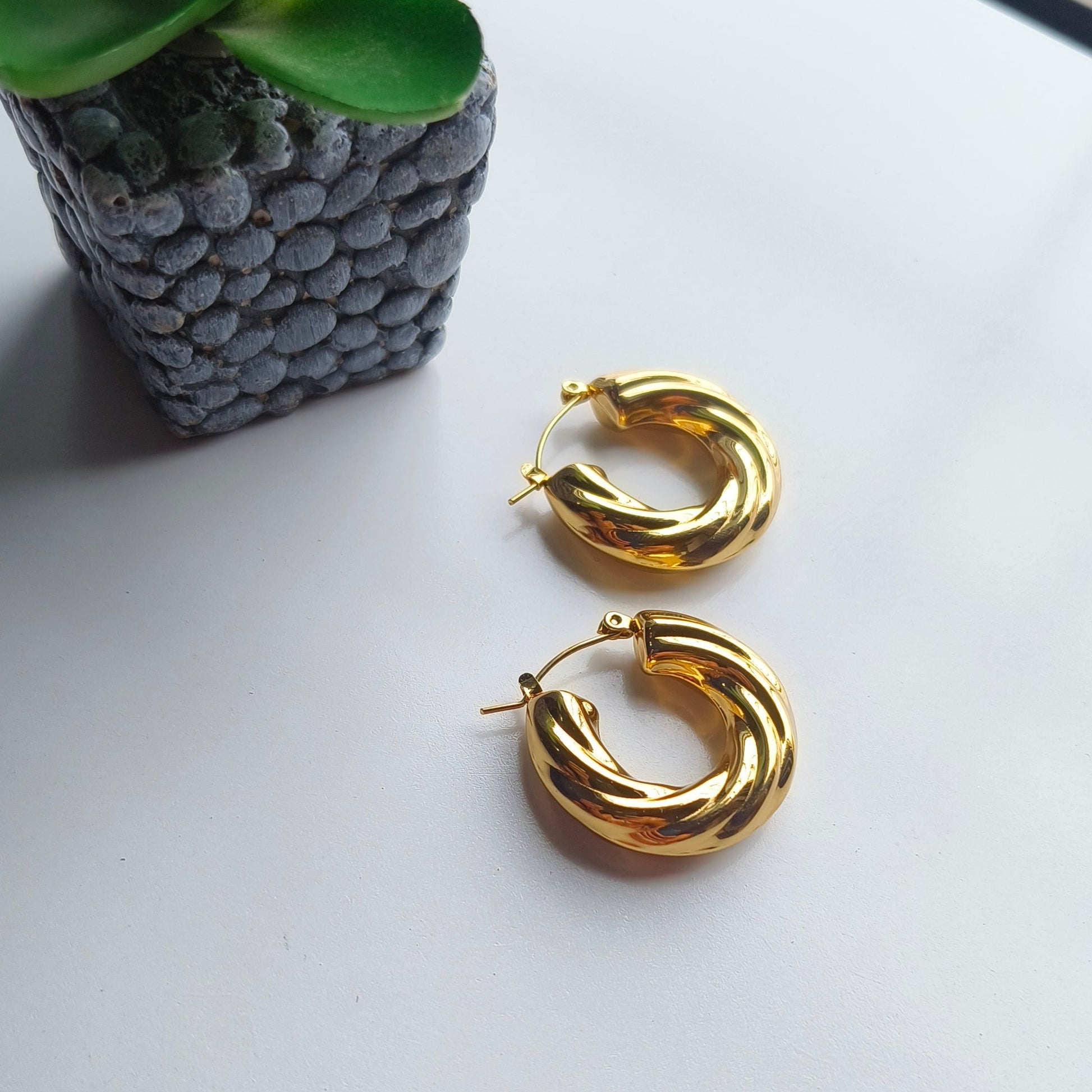 Elevate your style with our Be Friend Earrings that blend timeless elegance with modern sophistication. Crafted with meticulous attention to detail, these earrings are designed to be more than just accessories—they're a statement of refined taste.