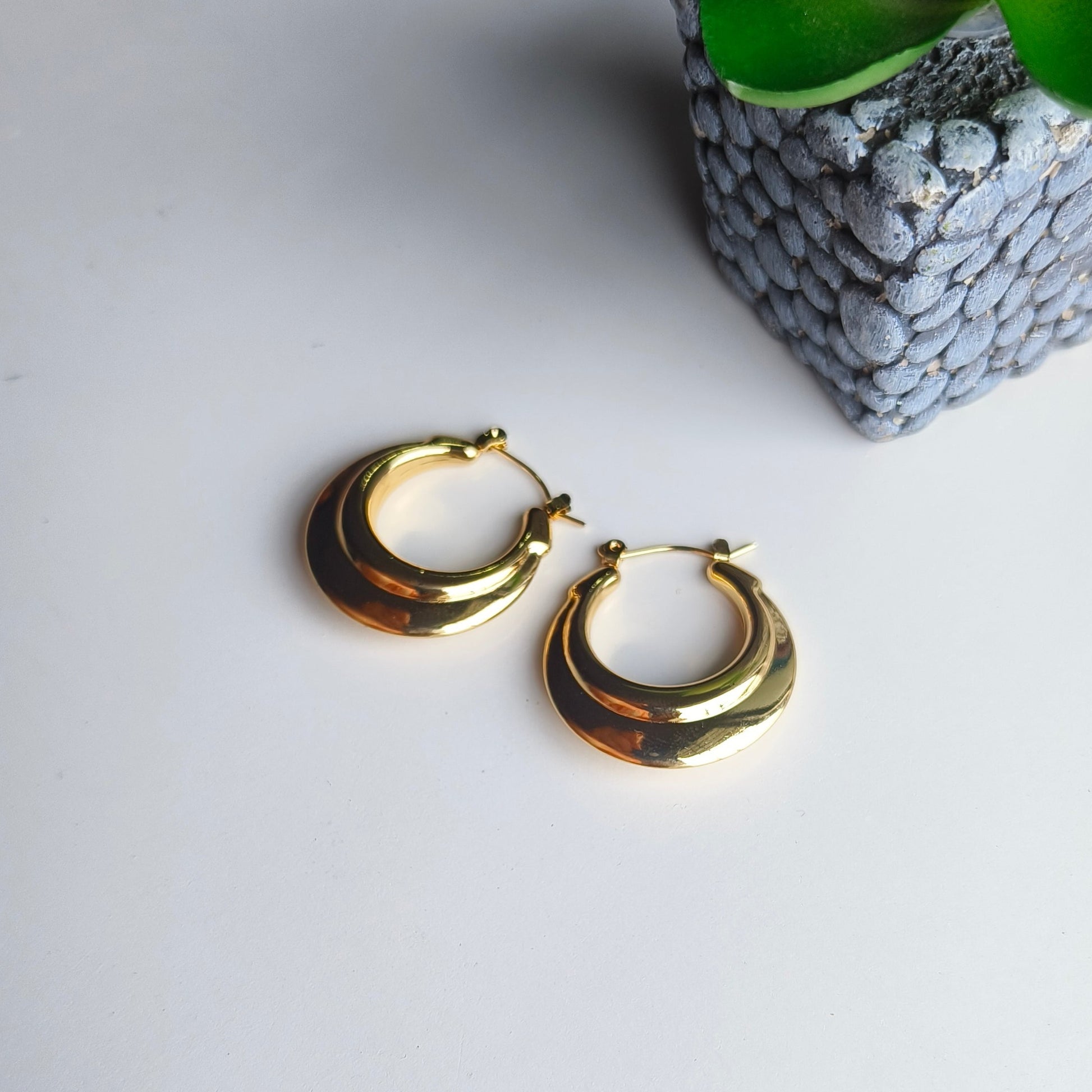 Elevate your style with our Bold Mood Earrings that blend timeless elegance with modern sophistication. Crafted with meticulous attention to detail, these earrings are designed to be more than just accessories—they're a statement of refined taste.